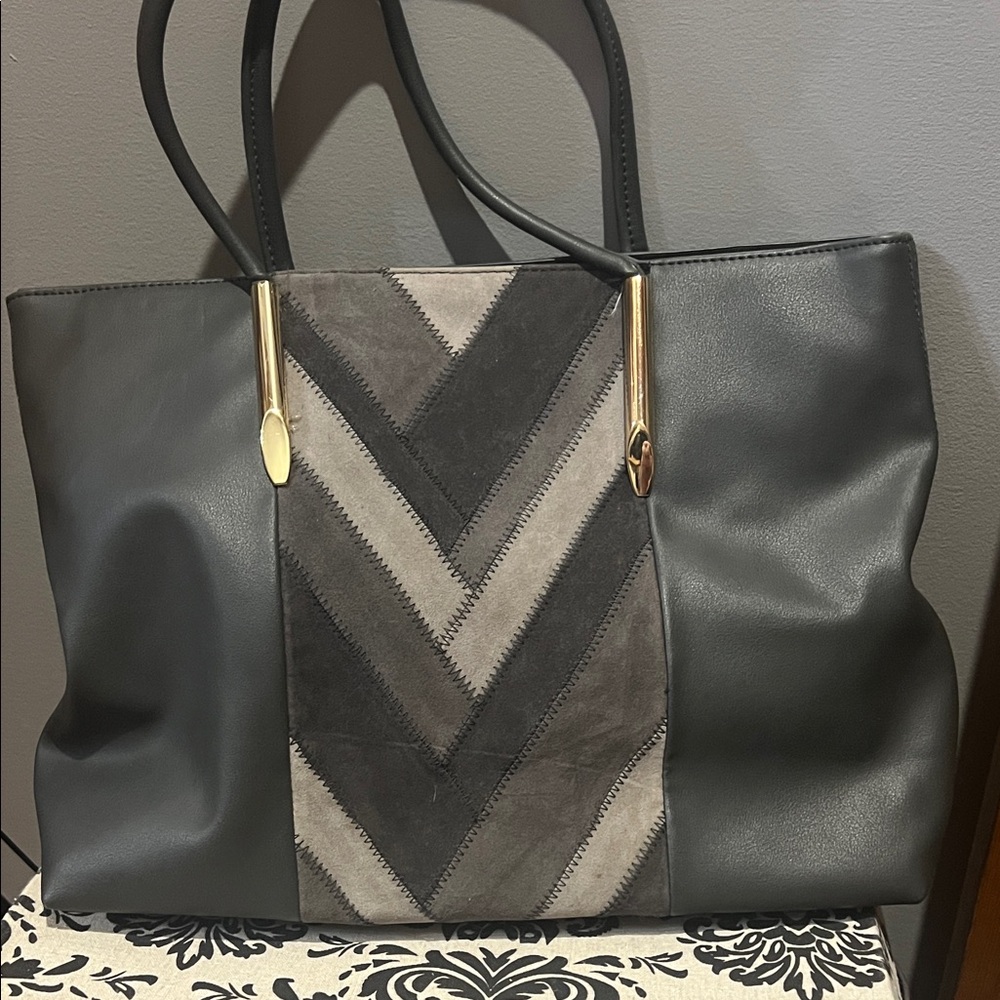 Elegant Black and Gray Tote Bag with gold details and chevron